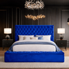 Luxurious plush ambassador bed with tall velvet tufted headboard in a modern UK bedroom